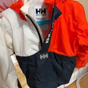 Helly Hansen Kids Orange White and Black Colorblock Rain Jacket